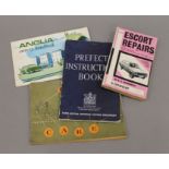 A selection of vintage car manuals.