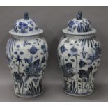 A pair of Chinese blue and white porcelain vases. 59 cm high.