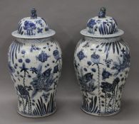 A pair of Chinese blue and white porcelain vases. 59 cm high.