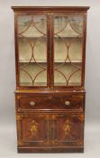 A 19th century inlaid mahogany secretaire bookcase. 208 cm high x 101.5 cm wide.