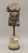 An early 20th century bronze model of a torso mounted on a marble base. 46 cm high overall.