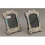 A pair of Art Nouveau style silver photograph frames. 16 x 21 cm.