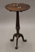 An early 20th century mahogany tilt top tripod table. 41 cm diameter.