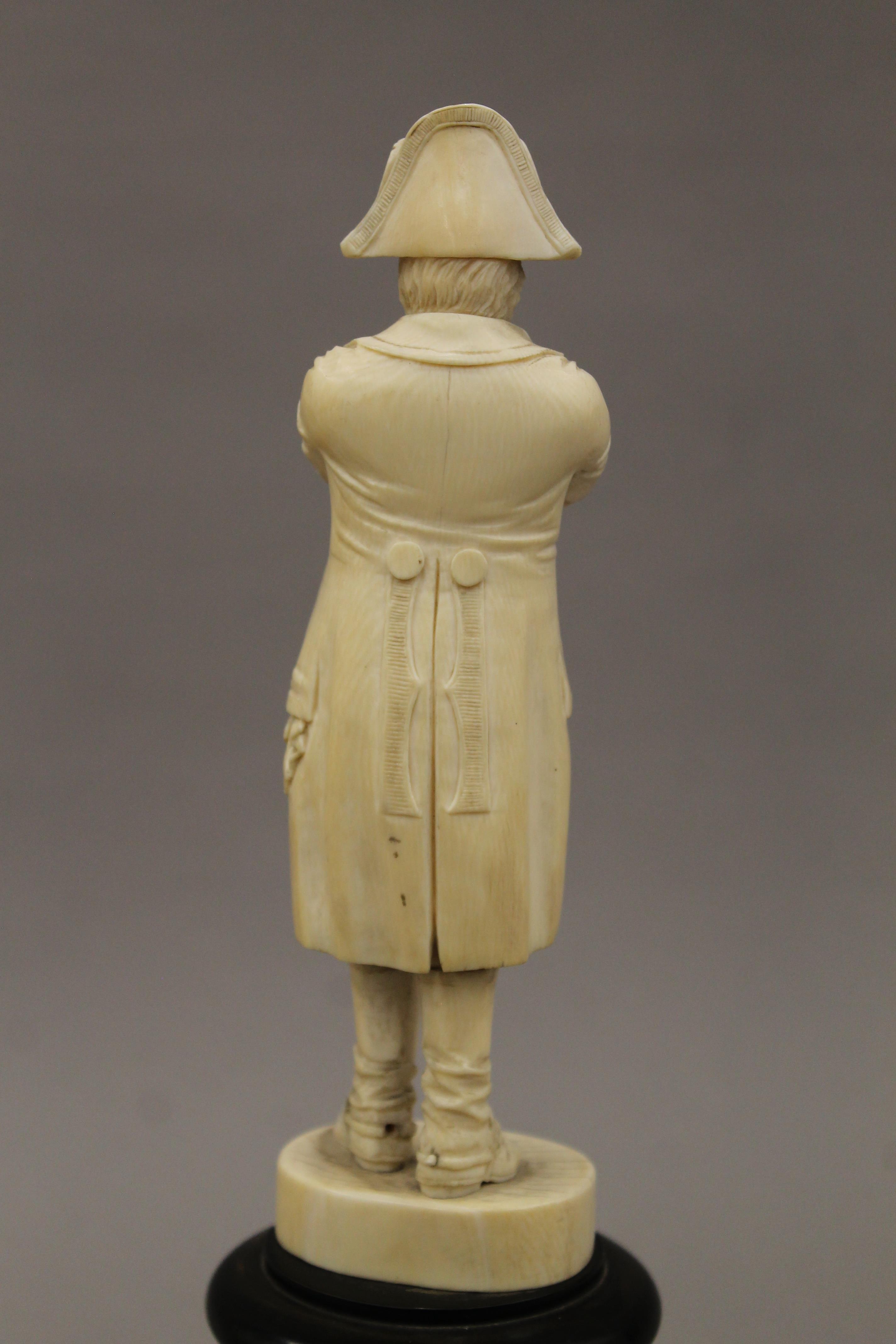 A 19th century Dieppe carved ivory model of Napoleon Bonaparte mounted on an ebonised wooden plinth - Image 6 of 6