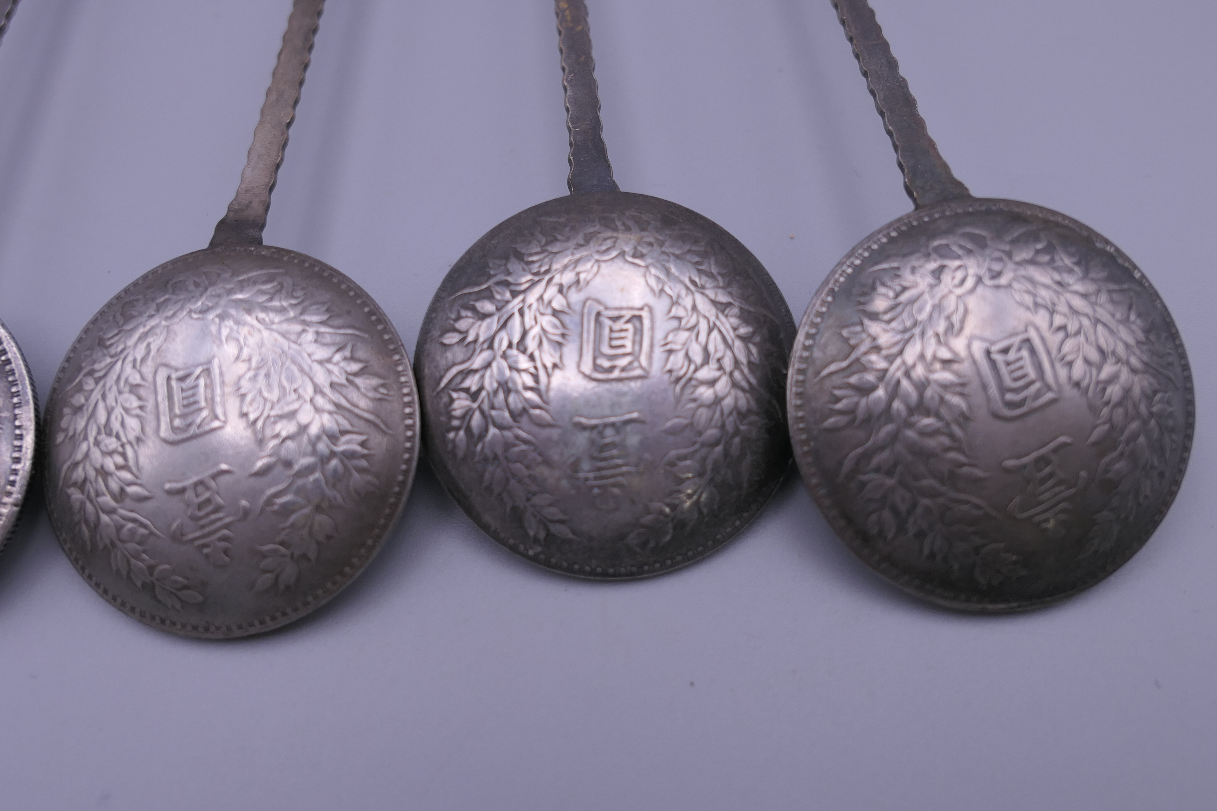 Six Chinese silver coin spoons. 17 cm long. - Image 10 of 11