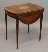 A 19th century mahogany inlaid Pembroke table. 73 cm deep.