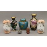 A collection of five cloisonne items and a pair of Chinese porcelain vases. The largest 18 cm high.