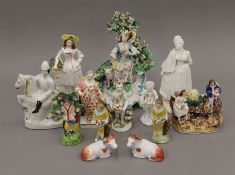 A quantity of 18th/19th century Staffordshire and other figures.