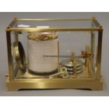 A 20th century French brass cased barograph. 20 cm wide.