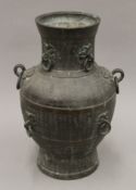 A 19th century Chinese bronze vase. 32 cm high.