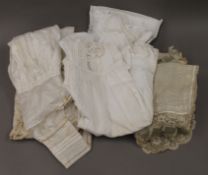 A quantity of Victorian Christening gowns, lace, etc.