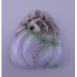 A lilac jade peach pendant carving. 6.75 x 7.25 cm.