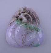 A lilac jade peach pendant carving. 6.75 x 7.25 cm.