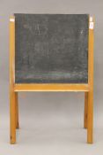 A vintage child's blackboard. 48 cm wide.