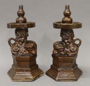 A pair of Chinese pottery brown glazed dog-of-fo water droppers. 23 cm high.