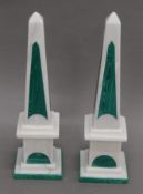 A pair of white and green obelisks. 43 cm high.