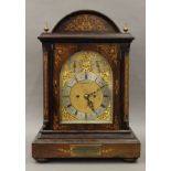A Victorian inlaid rosewood cased striking bracket clock,