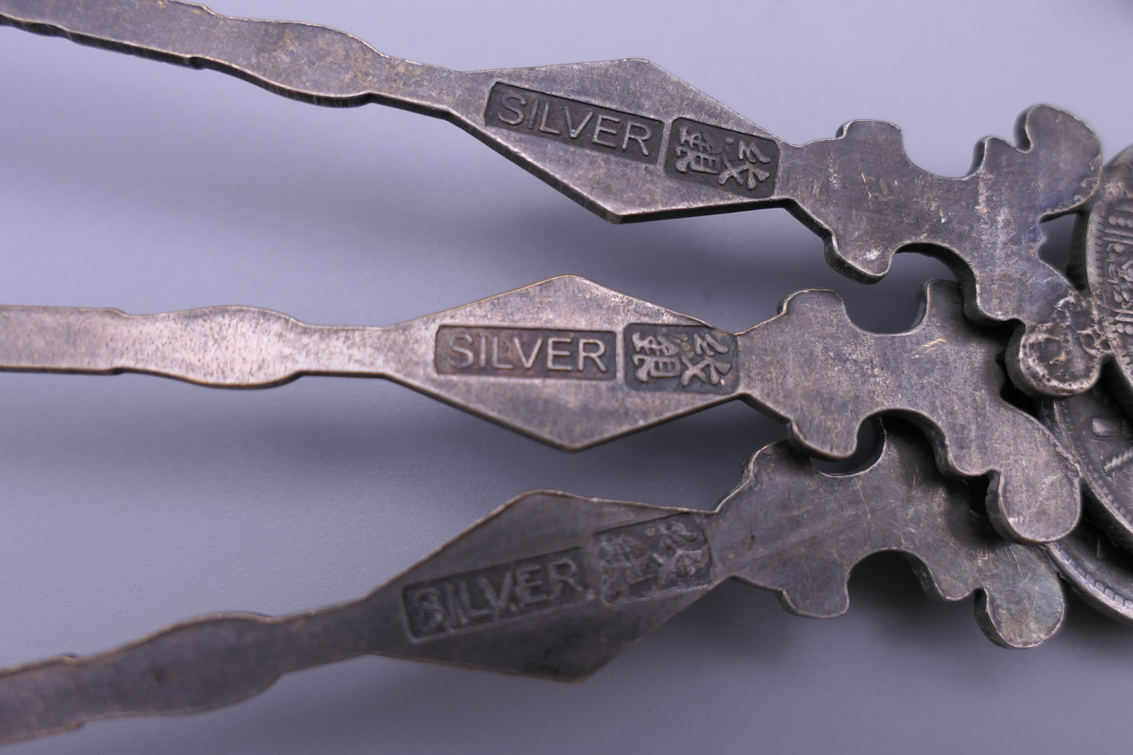 Six Chinese silver coin spoons. 17 cm long. - Image 8 of 11