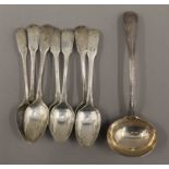 A Victorian silver ladle and a quantity of silver teaspoons. 218.7 grammes.