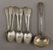 A Victorian silver ladle and a quantity of silver teaspoons. 218.7 grammes.