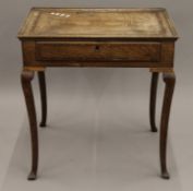 A Georgian inlaid oak single drawer side table. 71 cm wide.