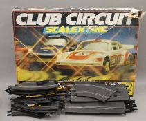 A boxed Lima Train set and a boxed Scalextric set.