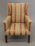 An early 20th century upholstered child's arm chair. 48.5 cm wide.