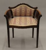 An Edwardian mahogany upholstered piano stool. 63 cm wide.