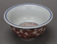 A Chinese porcelain tea bowl. 9.5 cm diameter.