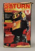 A boxed Saturn Walking Robot.