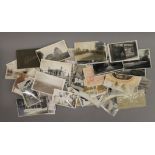 A quantity of vintage postcards.