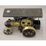 A Wilesco model traction engine. 27 cm long.
