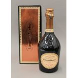 A bottle of Laurent-Perrier Cuvee Rose Champagne, boxed.