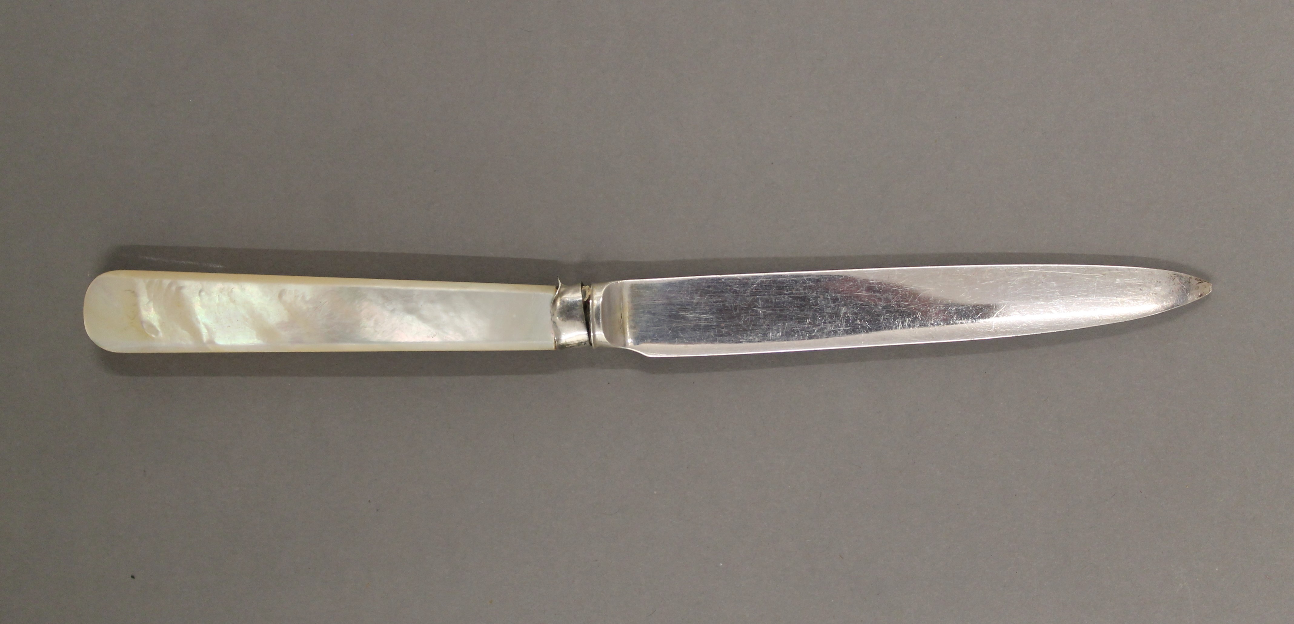 A cased set of mother-of-pearl and silver knives and forks. - Image 7 of 9
