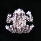 A diamond brooch in the form of a frog. 3.5 x 3 cm.