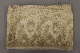 A large length of 19th century Brussels lace. 9 meters long x 21.5 cm high.