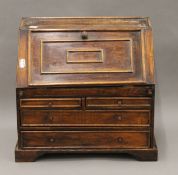 A miniature bureau. 38.5 cm wide.