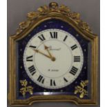 A small late 19th century French enamel decorated strutt clock. 11 cm high.