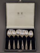 A cased set of six Mappin and Webb silver teaspoons. 134 grammes.