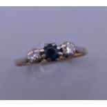 An 18 ct gold sapphire and diamond ring. Ring size P/Q.