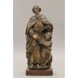 A 17th century Flemish religious carving on later base. 29 cm high.