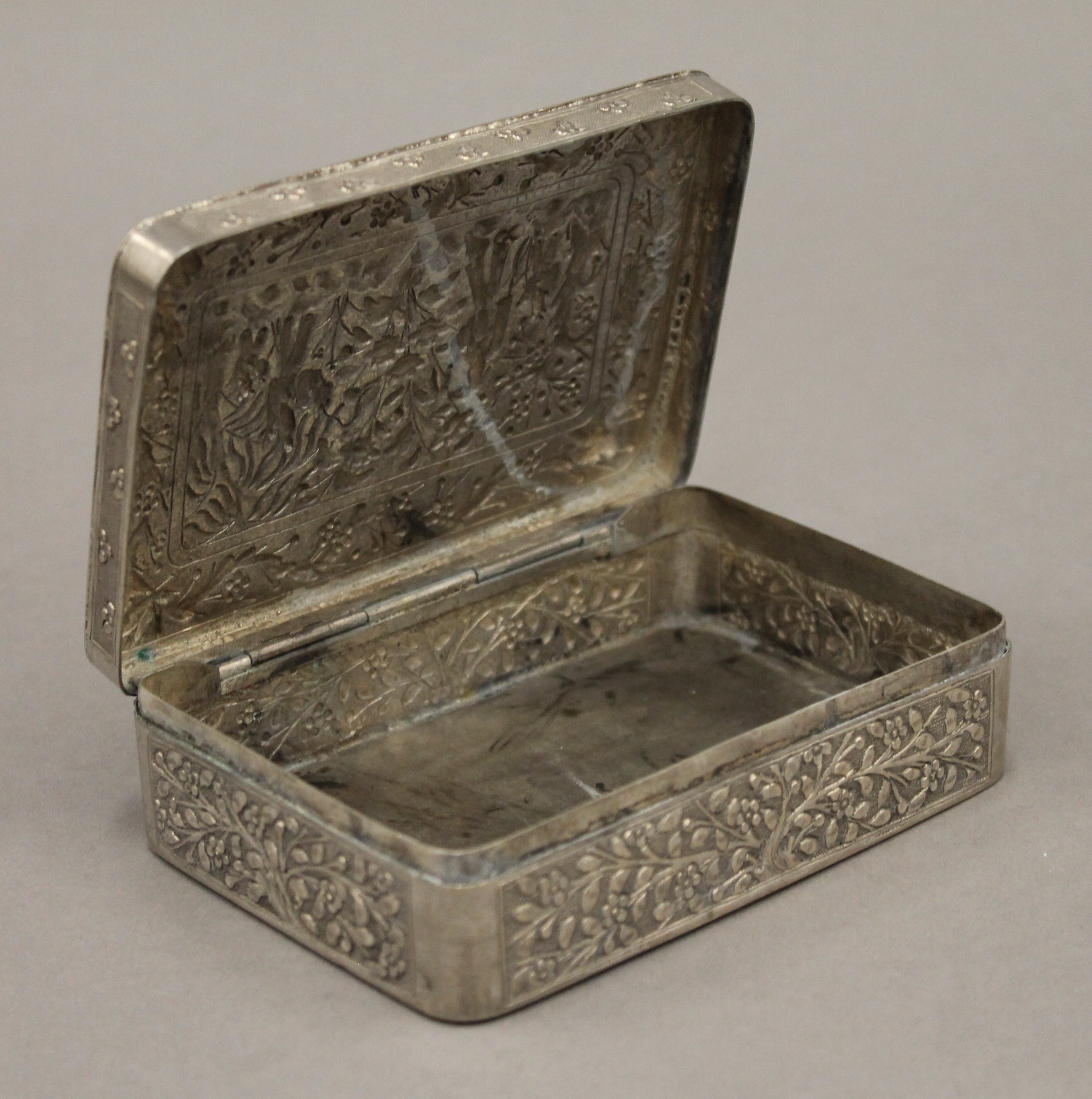 A 19th century Chinese silver box engraved with figures and trees, etc., seal marks to base. - Image 4 of 7