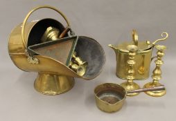 A quantity of brass and copper ware.