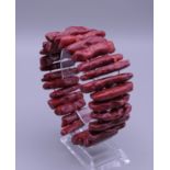 A coral bracelet. 18.5 cm inner circumference.