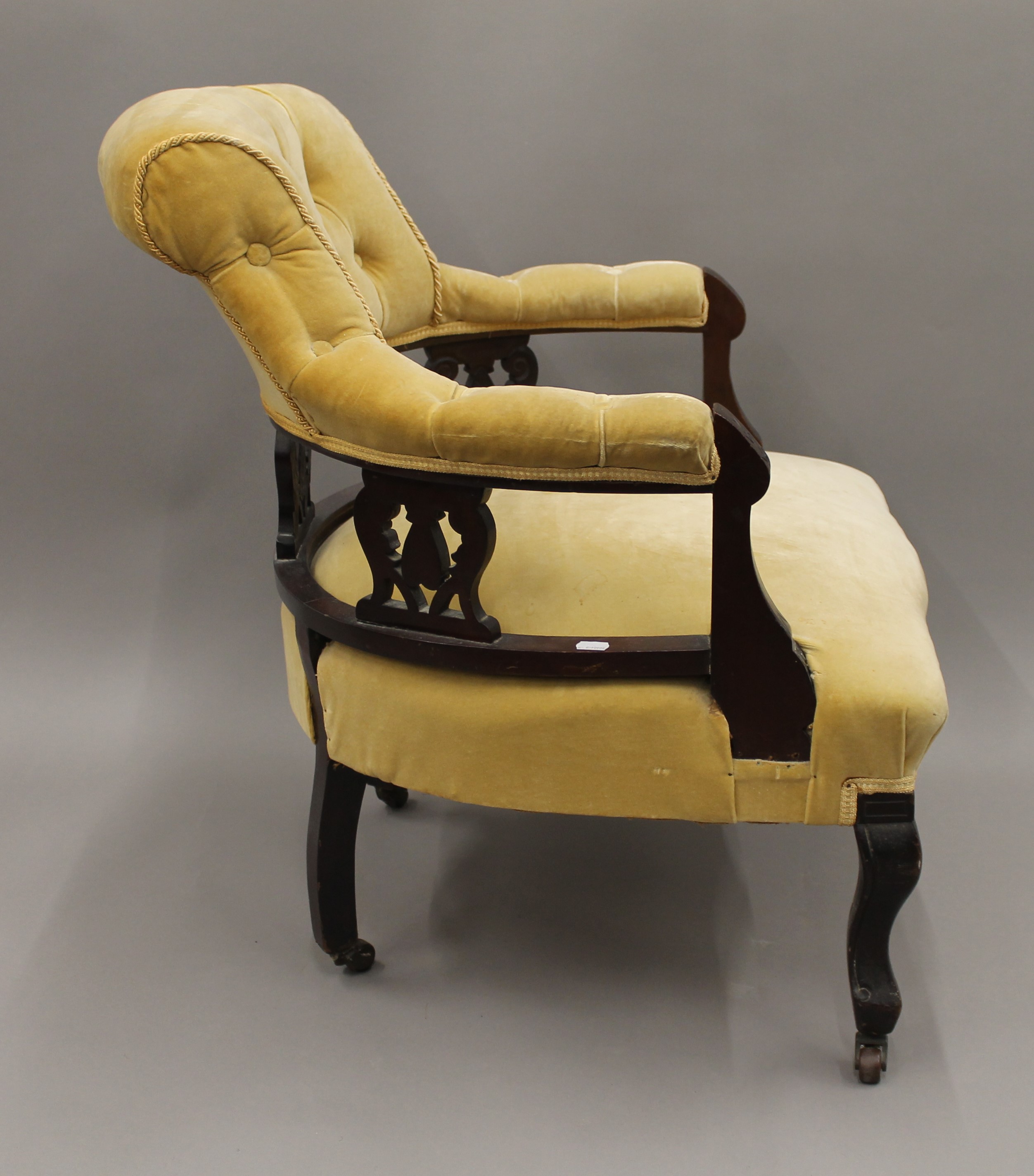 A Victorian upholstered open armchair. 63 cm wide. - Image 4 of 6