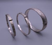 Three silver Christening bangles. The largest 6.5 cm diameter. 37.7 grammes.