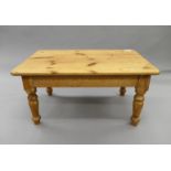 An early 20th century oak occasional table and a modern pine coffee table. The former 59 cm squared.