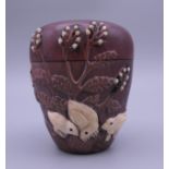 A Japanese bone and wood box decorated with chickens and foliage. 7.5 cm high.