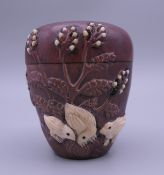 A Japanese bone and wood box decorated with chickens and foliage. 7.5 cm high.