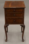 An early 20th century walnut set of bedside drawers. 38 cm wide.